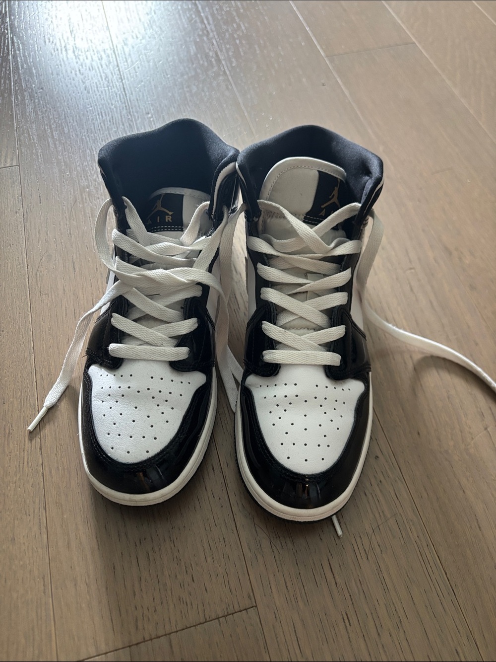 Jordan Women's Black and White High-Top Sneakers. Size 7Y fits 8 in women’s